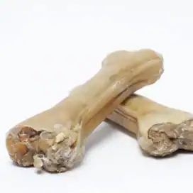 osso di pelle di bufalo con anatra e mela per cani