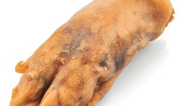 zampa di maiale essiccata per cani